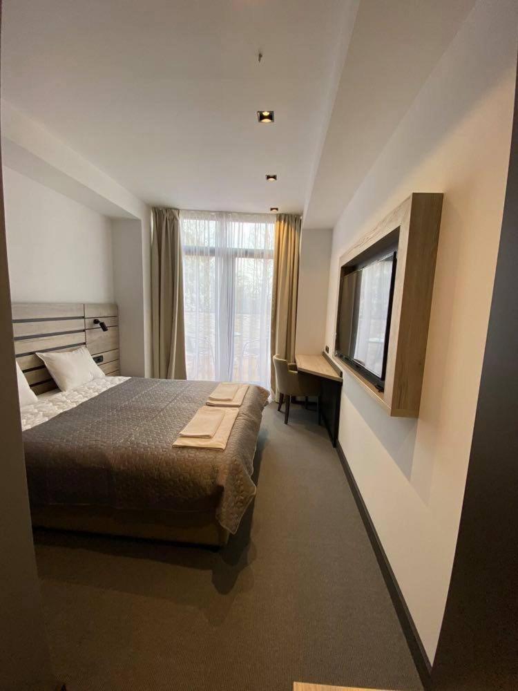 Super Seven Inn Belgrado Quarto foto