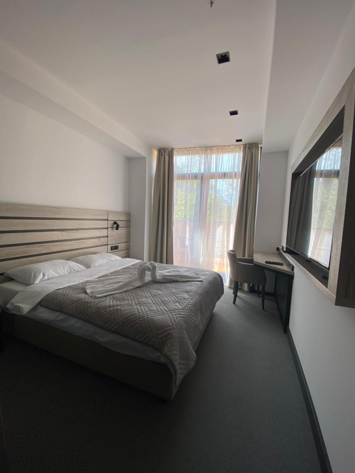 Super Seven Inn Belgrado Quarto foto
